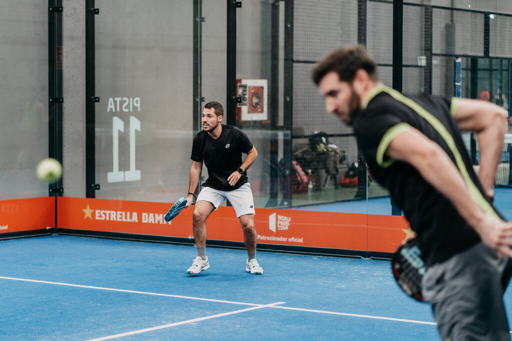 Padel players taking position during a doubles point